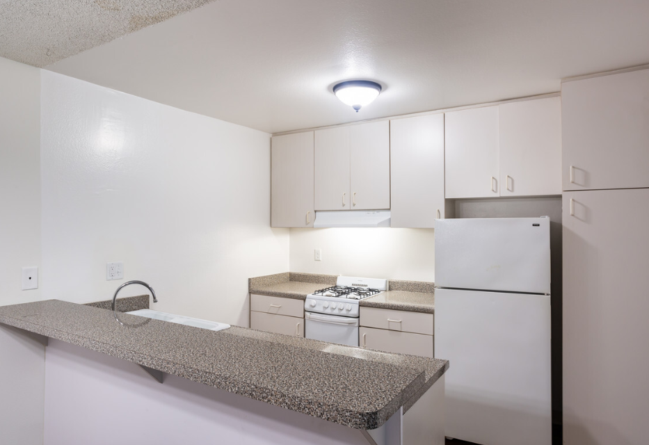 Windward Village Apartments unfurnished kitchen with appliances Windward Village Apartments unfurnished kitchen with appliances